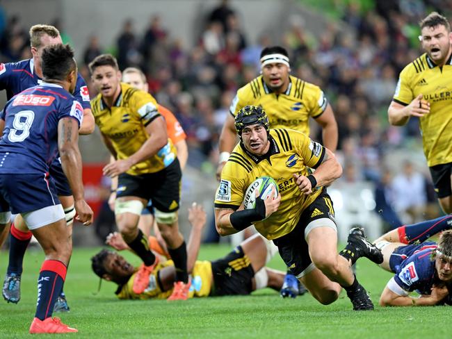 Jeffery Toomaga-Allen breaks a tackle during his time as a Hurricanes player. Picture: AAP Image/Joe Castro