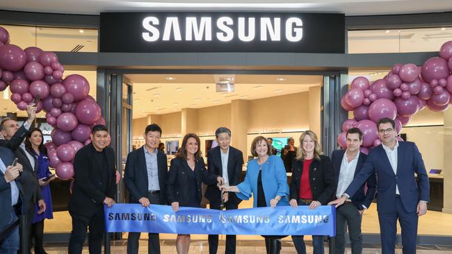 Samsung is the world’s largest maker of smartphones, semiconductors and televisions. It sells products in nearly every country around the globe. Above, a store opening in Texas. Picture: Getty Images