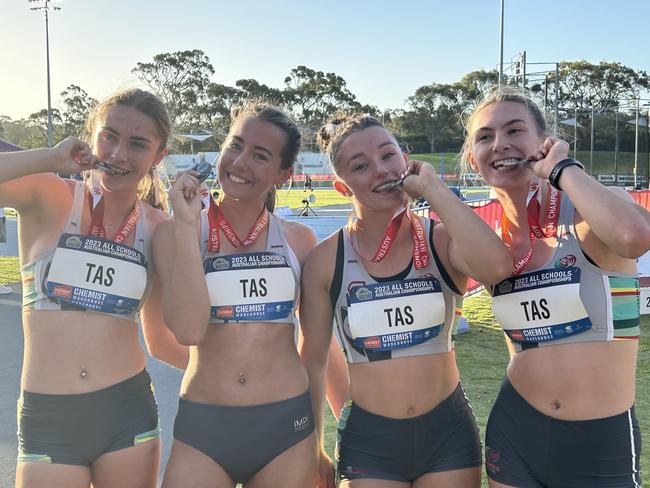 Tasmania's under-18 girls 100m relay team celebrates winning gold. Picture: Athletics Tasmania