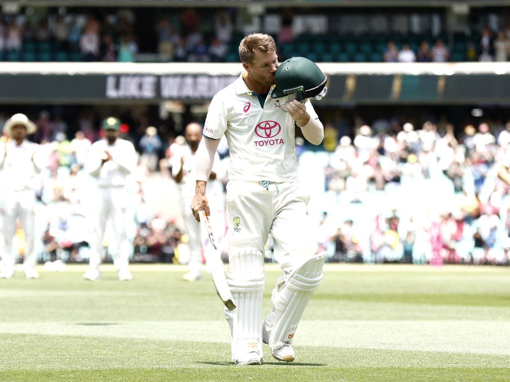 Thousands stood to farewell Warner in his final Test.