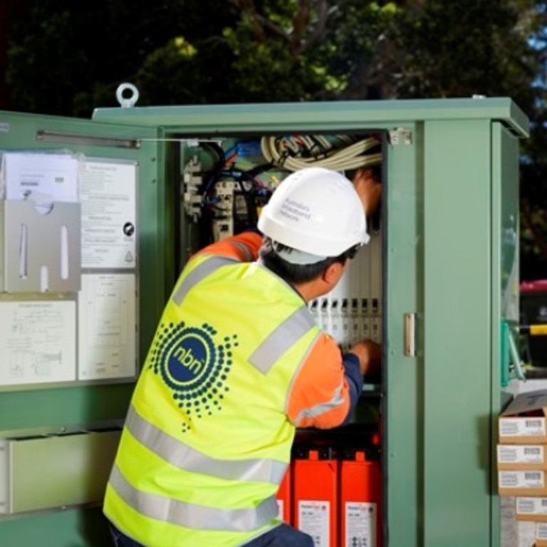 An NBN Co contractor installing infrastructure at Newcastle.