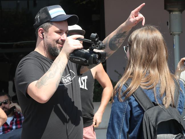 Right-wing activist Neil Erikson faces off against left-wing activists during a Fraser Anning political meeting in Melbourne last week. Picture: AAP Image/David Crosling