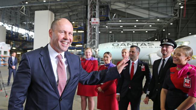 Treasurer Josh Frydenberg and airline staff at Sydney airport. Picture: Dylan Coker