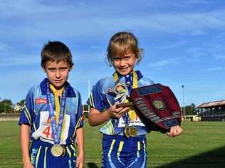 Athletics - Under 7 boys age champion and Friday Night Competition under 7 boys winner Hunter Jacobson and under 7 girls age champion, Adam and Courtney Cross Shields winner under 7 and Friday Night competition winner Piper Wilson. Picture: Bec Singh