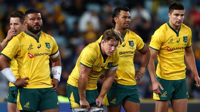 Michael Hooper of the Wallabies and teammates look dejected after an All Blacks try during The Rugby Championship Bledisloe Cup match between the Australian Wallabies and the New Zealand All Blacks at ANZ Stadium. Picture: Getty Images