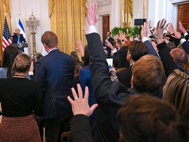 US President Donald Trump and Israel's Prime Minister Benjamin Netanyahu take questions during a press conference in the East Room of the White House in Washington, DC, on February 4, 2025. (Photo by Jim WATSON / AFP)