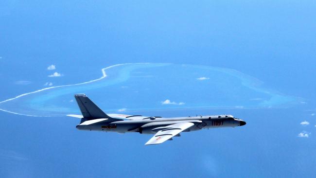 A Chinese H-6K bomber patrols the islands and reefs in the South China Sea in May last year. Picture: Liu Rui/Xinhua/AP