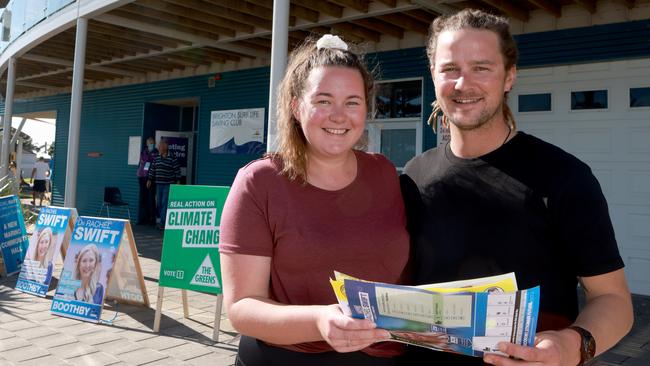 Madeline Carttanzio 26 with partner Joel smith 34 from Seaview Downs outside the Pre polling booths at Brighton after voting early in the 2022 Federal election. Photo Kelly Barnes