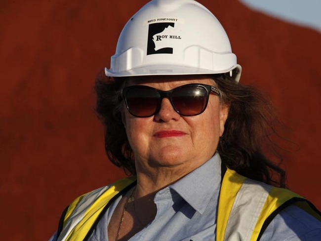 Billionaire Gina Rinehart, chairman of Hancock Prospecting Pty, stands for a photograph during a tour of the company's Roy Hill Mine operations under construction in the Pilbara region, Western Australia, on Thursday, Nov. 20, 2014. Rinehart, the Asia-Pacific's richest woman, is set to start exports in September from her new A$10 billion ($8.6 billion) iron ore mine undeterred by prices trading near five-year lows and forecast to extend losses. Photographer: Philip Gostelow/Bloomberg *** Local Caption *** Gina Rinehart