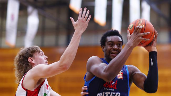 An elite defender, Ariel Hukporti (R) had attracted interest from NBA scouts. Picture: Getty