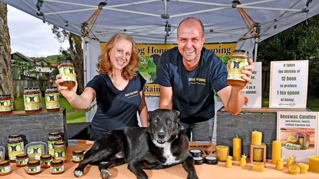 Jens and Lisa Roestel with Ben the dog for Black Dog Honey. New farmers market in Robina. Friday May 24, 2024. Picture, John Gass