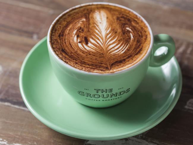 The cafe also use The Grounds signature colours, including pastel green cups. Picture: AAP/Image Matthew Vasilescu