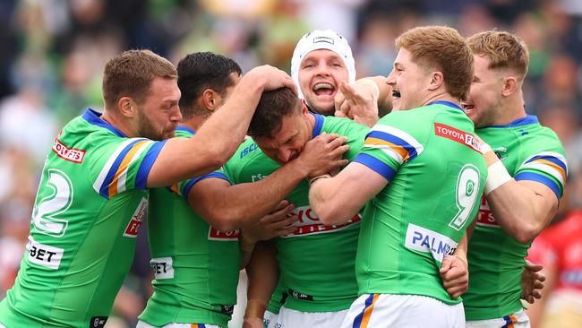 WAGGA WAGGA, AUSTRALIA - APRIL 29: Jack Wighton of the Raiders celebrates scoring a try with team mates during the round nine NRL match between the Canberra Raiders and Dolphins at McDonalds Park on April 29, 2023 in Wagga Wagga, Australia. (Photo by Mark Nolan/Getty Images)