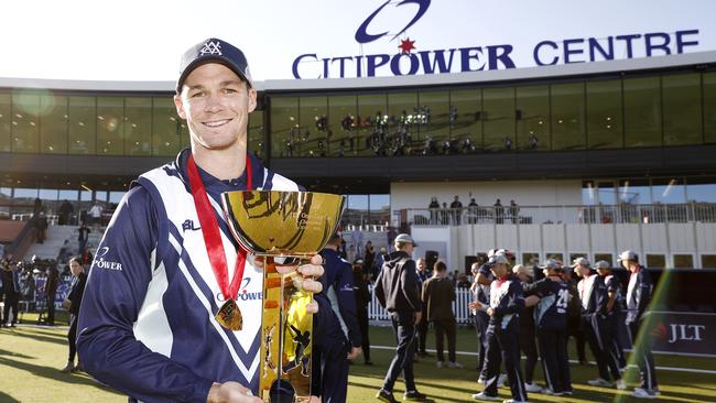 Victorian captain Peter Handscomb with the JLT One-Day Cup at Cricket Victoria’s administration base at the Junction Oval. Picture: Daniel Pockett