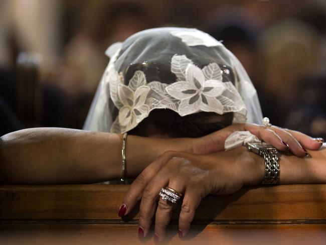 A Coptic Christian grieves in Cario as the Egyptian President said it “will take time” to determine the cause of the crash. Picture: Amr Nabil