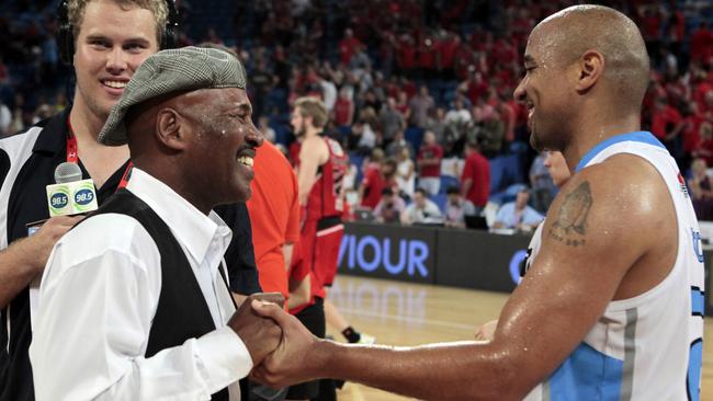 Cal and CJ Bruton together after the Wildcats v Breakers grand final in 2013.