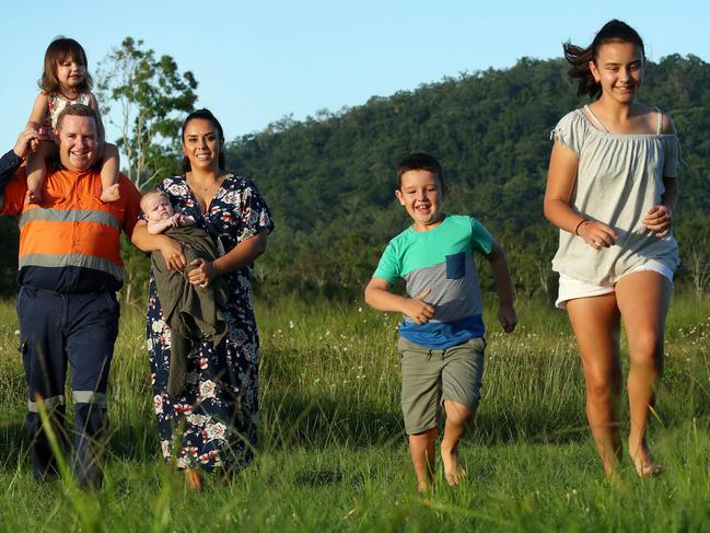 Miner Sam Triffett, 39, at home with wife Bella, 39, and kids Sage, three months, Millie, 2, Khai, 7, and Avia, 12. Picture: Liam Kidston