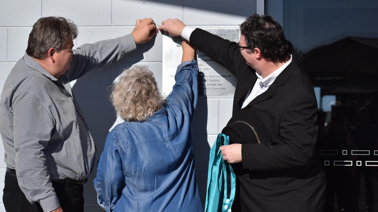 Whitsunday councillor John Collins, Show Whitsunday committee president Donna Rogers, and Dawson MP George Christensen unveiled a plaque honouring those who contributed funds to build the new pavilion. Picture: Kirra Grimes