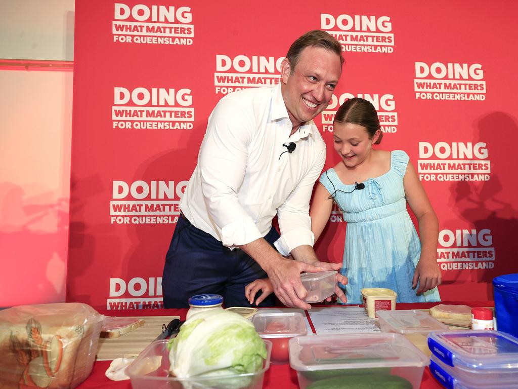 Premier Miles makes a sandwich with his daughter Bridie, 10, on stage. Picture: Adam Head