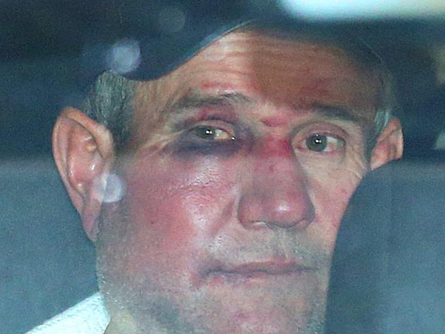 Gino Stocco sits in the back of a police vehicle as he is taken into Dubbo police station. Picture: AAP