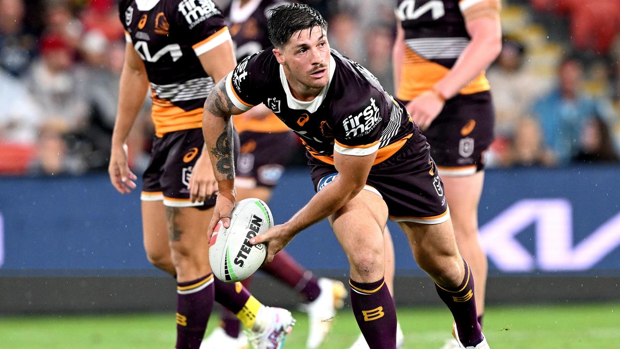 BRISBANE, AUSTRALIA - MARCH 10: Cory Paix of the Broncos looks to pass during the round 2 NRL match between the Brisbane Broncos and the North Queensland Cowboys at Suncorp Stadium on March 10, 2023 in Brisbane, Australia. (Photo by Bradley Kanaris/Getty Images)