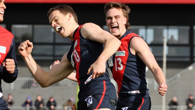 Mitch Podhajski and Brayden Gillard celebrate a goal. Picture: George Salpigtidis