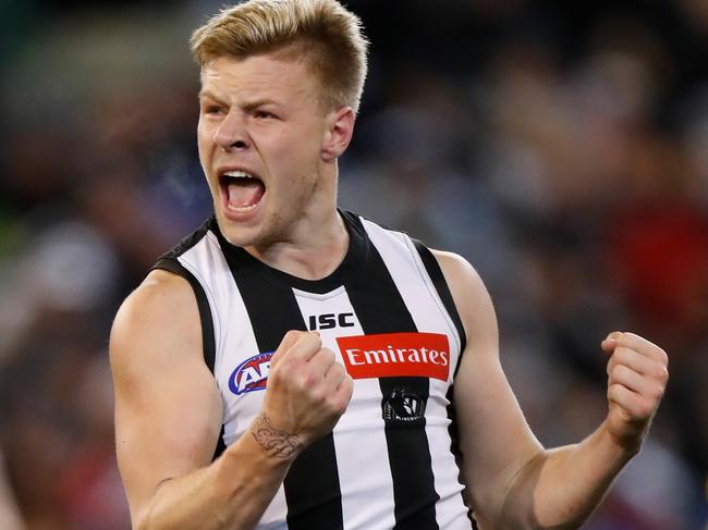 MELBOURNE, AUSTRALIA - SEPTEMBER 15: Jordan De Goey of the Magpies celebrates a goal during the 2018 AFL Second Semi Final match between the Collingwood Magpies and the GWS Giants at the Melbourne Cricket Ground on September 15, 2018 in Melbourne, Australia. (Photo by Michael Willson/AFL Media/Getty Images)