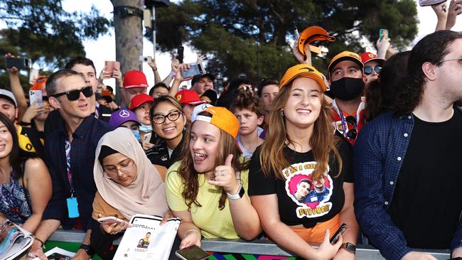 : Fans wait for the drivers to arrive