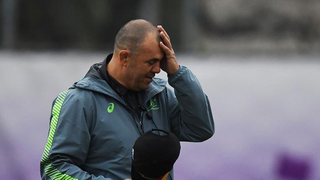 (FILES) This file photo taken on October 17, 2019 shows Australia's head coach Michael Cheika attending a training session at Matsuoka ground in the Japanese southern city of Oita during the Japan 2019 Rugby World Cup. - Australia coach Michael Cheika announced his resignation on October 20, 2019, a day after the Wallabies' defeat by England in the World Cup quarter-finals. (Photo by CHARLY TRIBALLEAU / AFP)