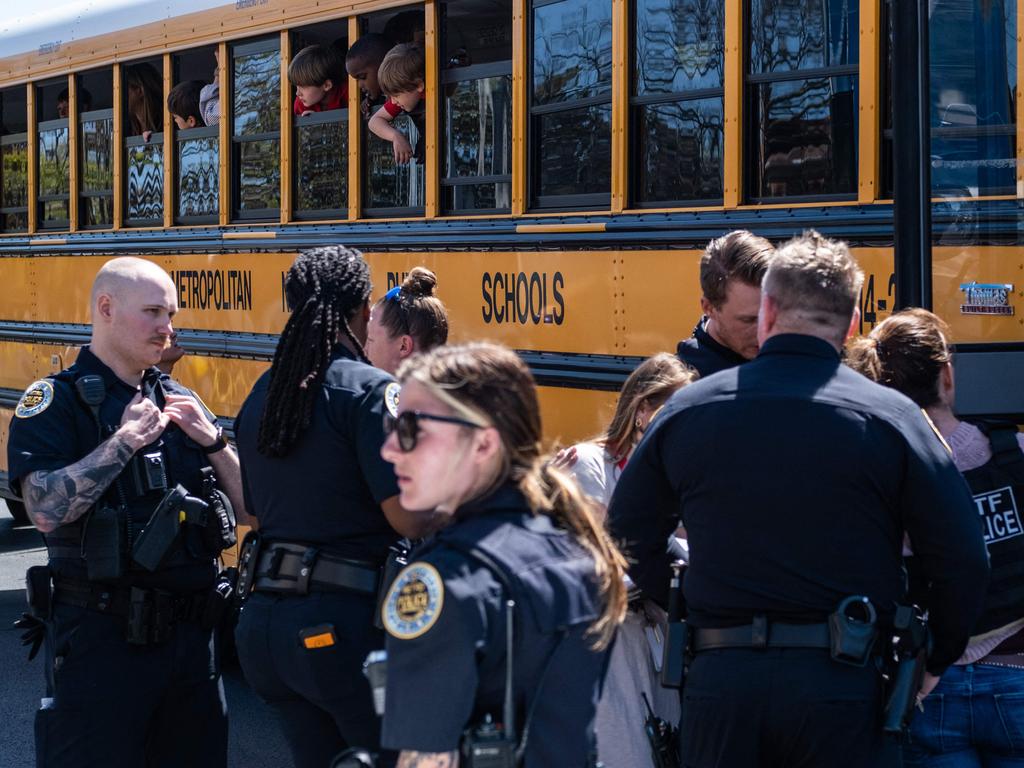 School buses with children arrive at Woodmont Baptist Church to be reunited with their families after the mass shooting at The Covenant School. Picture: Seth Herald/Getty Images