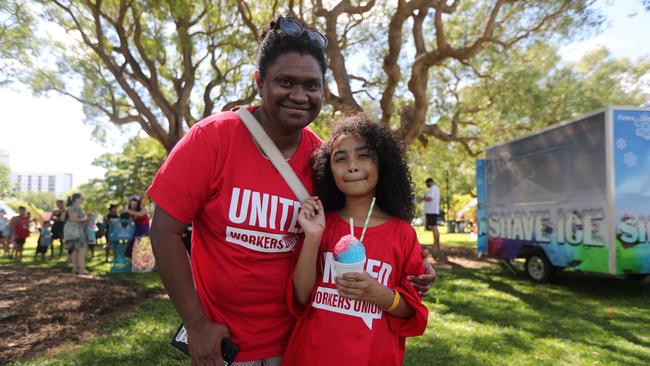 Fellie Diweula with Mia Kassman, 7, after the Darwin May Day march on Monday, May 5. Picture: Zizi Averill
