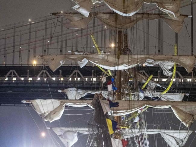 The sails of a disabled Mexican Navy tall ship fly as the subway passes over the Manhattan Bridge on the East River on May 17, 2025 in New York City. Picture: Getty Images via AFP