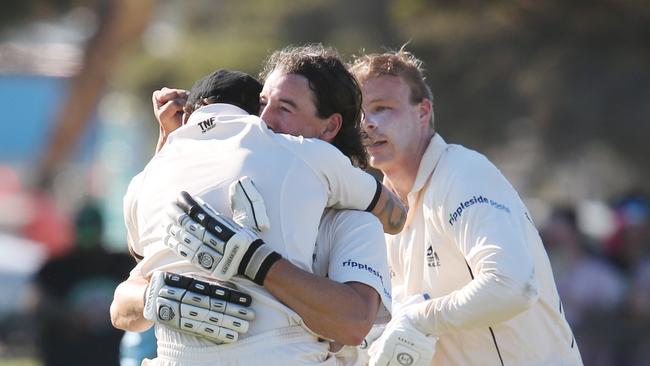 Hall (centre) celebrates the Magpies’ GCA1 win over East Belmont with Andrew Ferguson and Steve Meehan (right). Picture: Mark Wilson