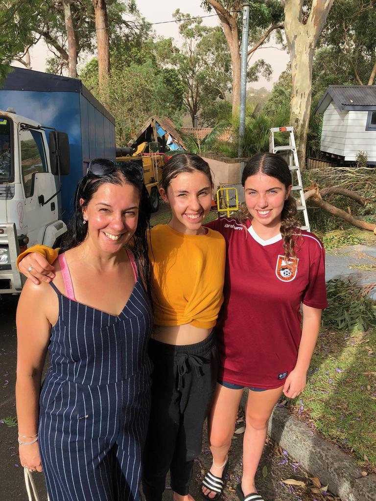 A tree crashes into a bedroom of a home in Brolga Pl, Belrose. Tenant Rachael Jackson and her two daughters Madeline, 13, and Leah, 14, were staying in good spirits despite the prospect of being homeless for a while while their rented home is repaired: Jim O'Rourke.