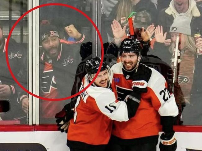 Philadelphia Eagles star Jordan Mailata cheering on the Philadelphia Flyers.