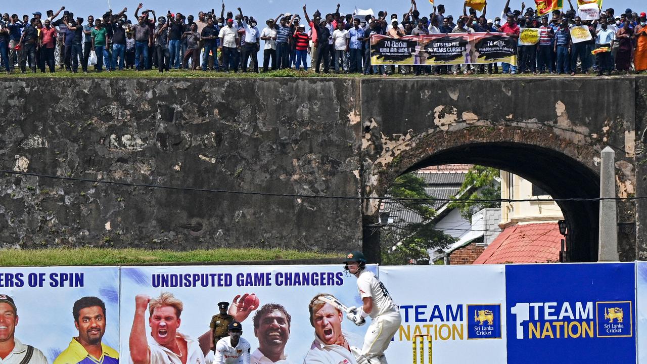 Protesters participate in an anti-government demonstration outside the Galle International Cricket Stadium during day 2 of the second Test. Picture: AFP