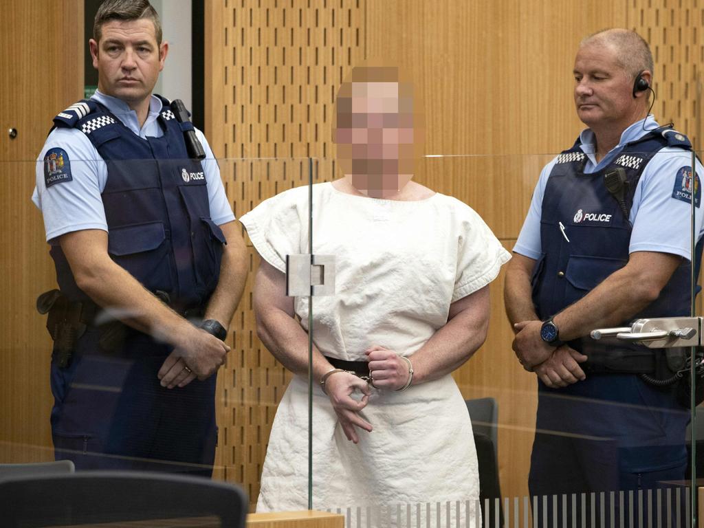 Tarrant smirked and made a white supremacist gesture in court. Picture: Mark Mitchell/AFP 