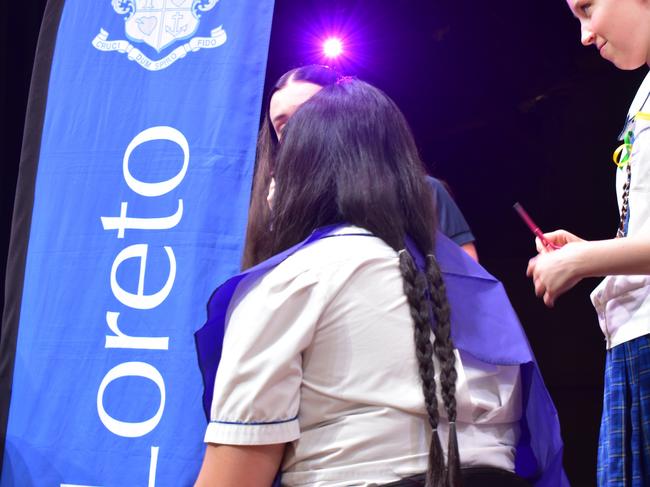 Year 12 students at Loreto College 'Rocked the Chop' for the Cancer Council's Ponytail Project.