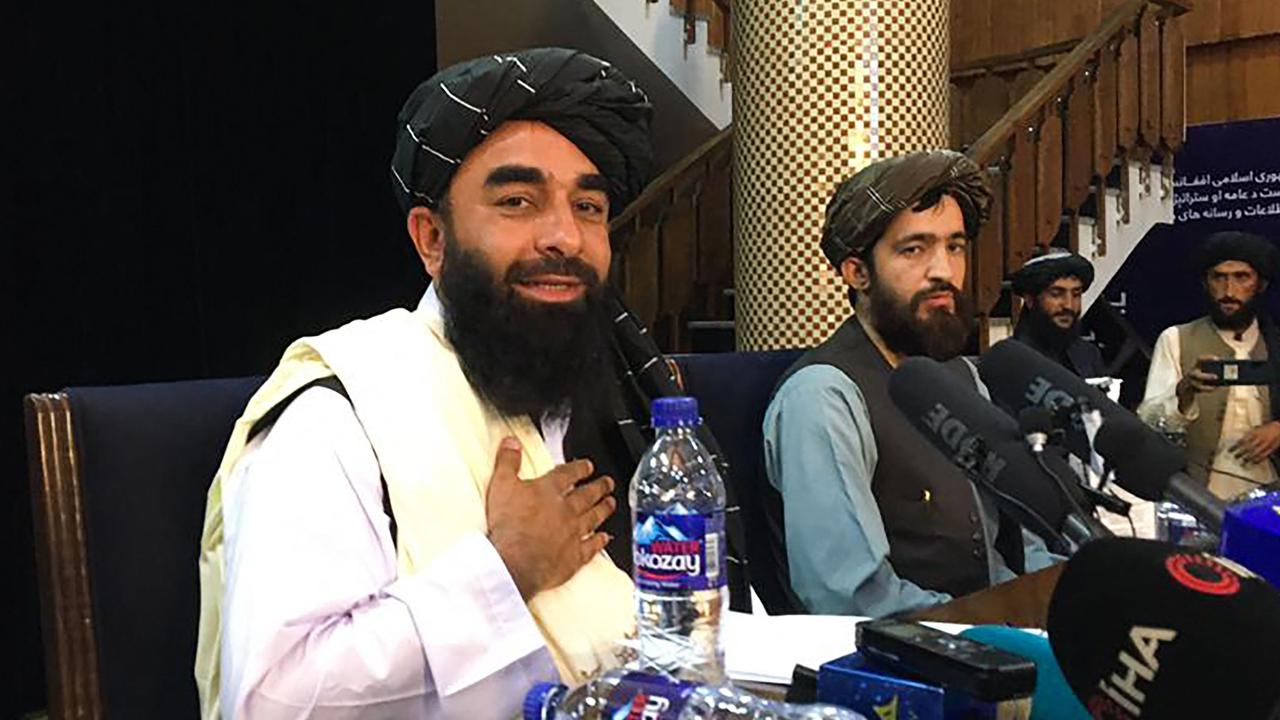 Taliban spokesperson Zabihullah Mujahid (L) attends the first press conference in Kabul. Picture: Hoshang Hashimi/AFP