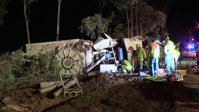 Crews spent more than an hour trying to free the trapped driver Picture: SEQ News.