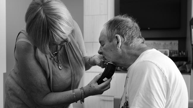 Cindy Ramage helps her husband Joe, who has dementia. Picture: Gary Ramage