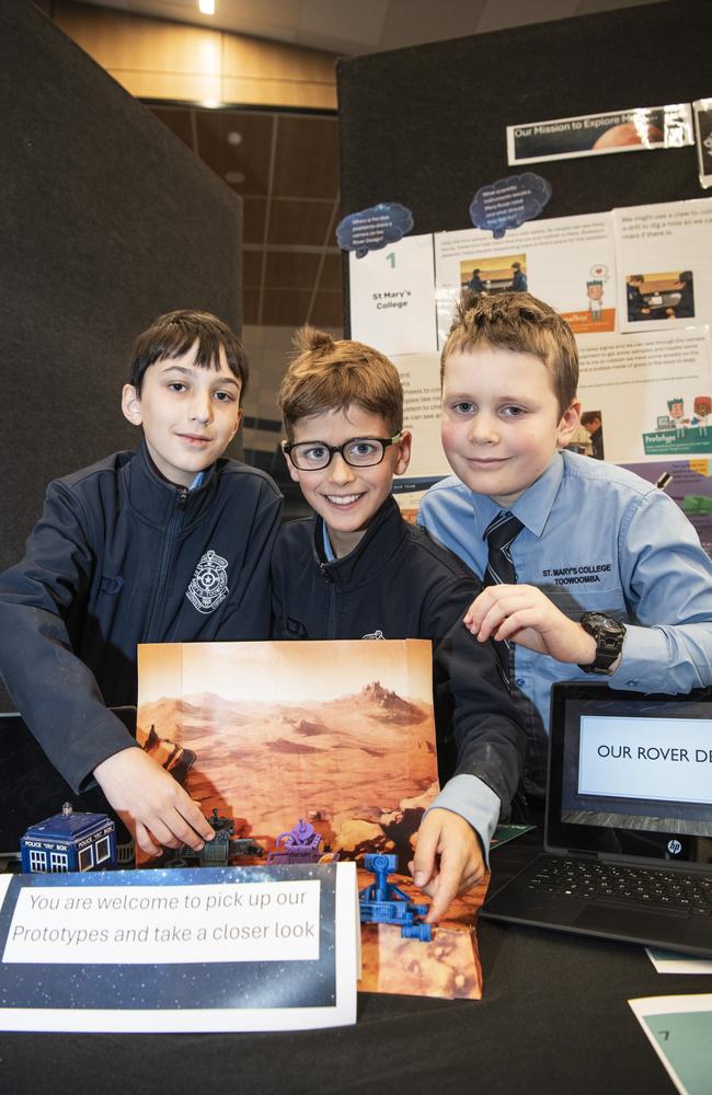 St Mary's College students (from left) Joshua Collins, Hugo Brownsdon and Riley Gibson with their mission to mars project in Kids in Space Queensland finals and showcase at Edmund Rice Cultural Centre St Mary's College, Friday, June 7, 2024. Picture: Kevin Farmer