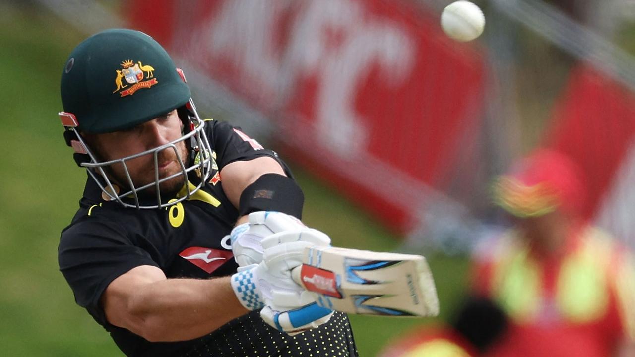 Australia's captain Aaron Finch plays a shot during the 2nd cricket T20 match between New Zealand and Australia at University Oval in Dunedin on February 25, 2021. (Photo by Marty MELVILLE / AFP)