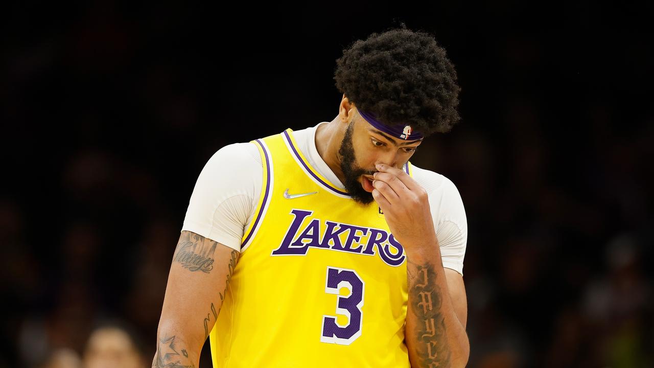 PHOENIX, ARIZONA – APRIL 05: Anthony Davis #3 of the Los Angeles Lakers walks to the bench during the second half of the NBA game against the Phoenix Suns at Footprint Center on April 05, 2022 in Phoenix, Arizona. The Suns defeated the Lakers 121-110. NOTE TO USER: User expressly acknowledges and agrees that, by downloading and or using this photograph, User is consenting to the terms and conditions of the Getty Images License Agreement. Christian Petersen/Getty Images/AFP == FOR NEWSPAPERS, INTERNET, TELCOS &amp; TELEVISION USE ONLY ==