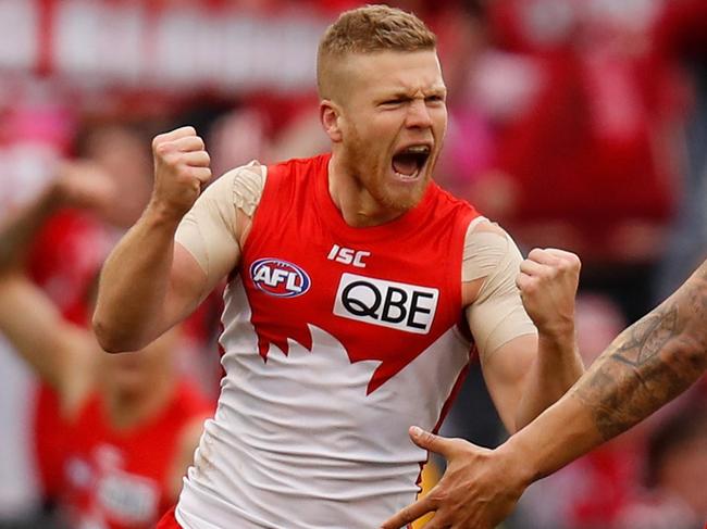 MELBOURNE, AUSTRALIA - AUGUST 12: Dan Hannebery of the Swans and Lance Franklin of the Swans (right) celebrate during the 2018 AFL round 21 match between the Melbourne Demons and the Sydney Swans at the Melbourne Cricket Ground on August 12, 2018 in Melbourne, Australia. (Photo by Michael Willson/AFL Media/Getty Images)