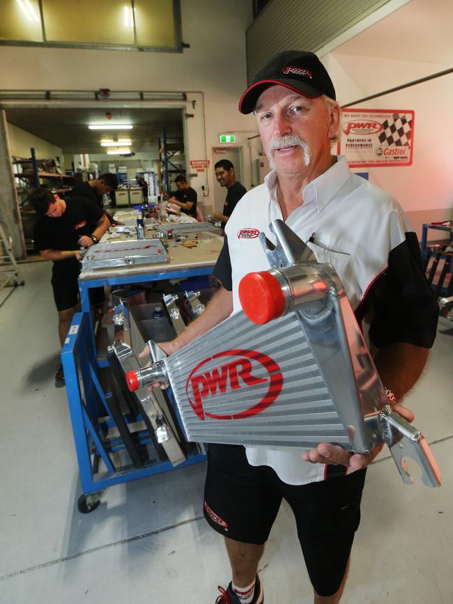 PWR boss Kees Weel with a cooling system at his /ASX-listed company PWR Performance Products at Ormeau, which makes cooling systems for NASCAR. Picture Mike Batterham