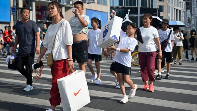 Residents are being encouraged to buy goods to stimulate the economy. Picture: Wang Zhao/AFP