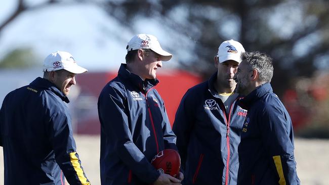 Adelaide Crows training at West Lakes last year – Paul Thomas, Ben Hart, Marty Mattner and Scott Camporeale. Only Hart remains out of these four coaches and he is banned from the club for six weeks. Picture: Sarah Reed.