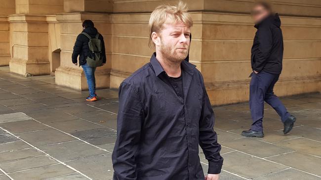 Christopher John West outside the District Court, where he pleaded guilty to having trafficked drugs by firing drug-laden arrows over the walls of Port Augusta Prison. Picture: Sean Fewster