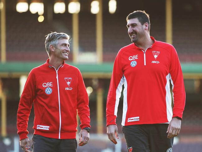 Once great rivals, Kirk and Cox are now part of the coaching group trying to deliver the Swans their next premiership. Picture: Phil Hillyard